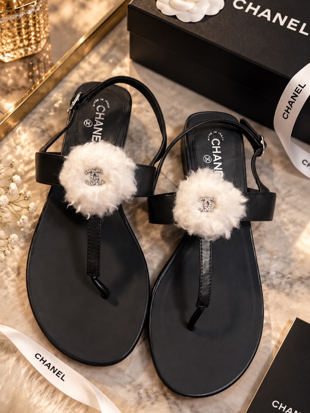 CHANEL Black Leather Thong Sandals with White Fur Rosette and Crystal CC